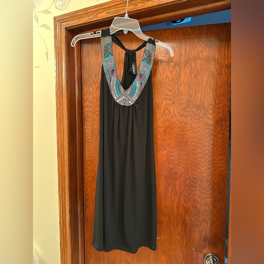 Black cocktail dress with embellishments